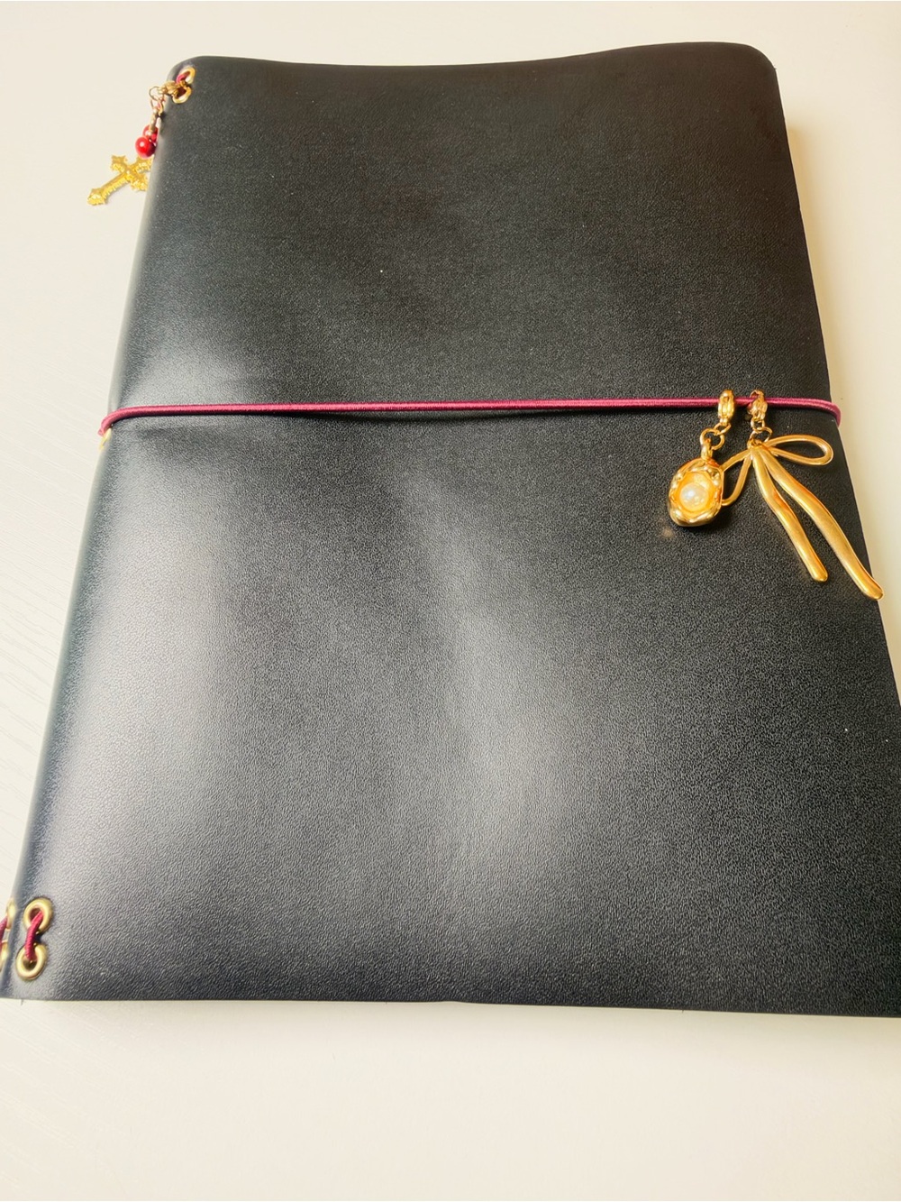 Black Travel Notebook Cover with Red Elastic and Gold Charms A5